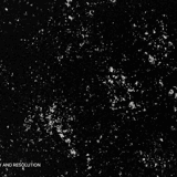 Sparse fine dust particles as subtle white specks across a deep black canvas