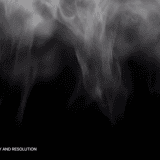 Thin rising smoke and fog tendrils floating upward against a black background