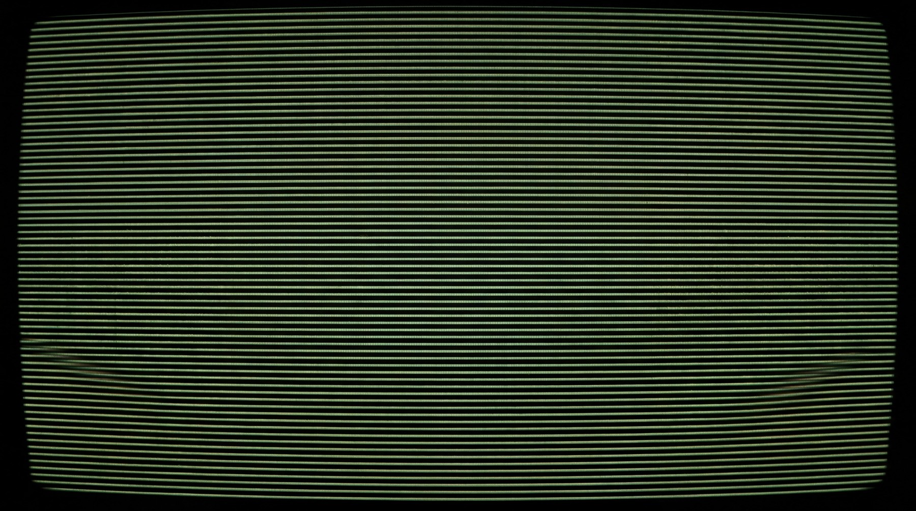 A digital texture displaying subtle, horizontal analog tracking lines with minor warping, resembling a distressed VHS tape or CRT monitor display.