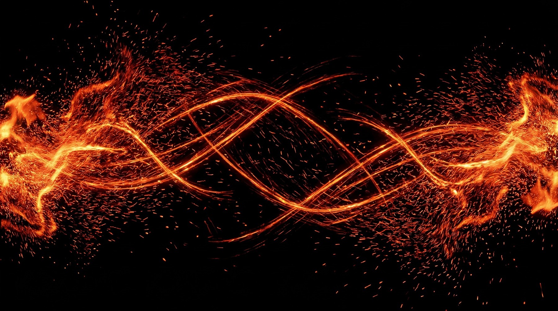 Dynamic display of fiery orange embers and thin, interwoven energy trails against a black background.