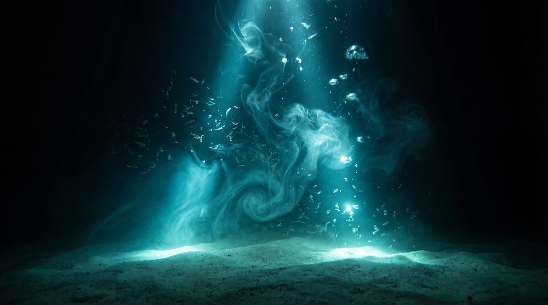 Underwater scene with luminous blue mist swirling around scattered particles and bubbles, illuminated by a shaft of light from above.