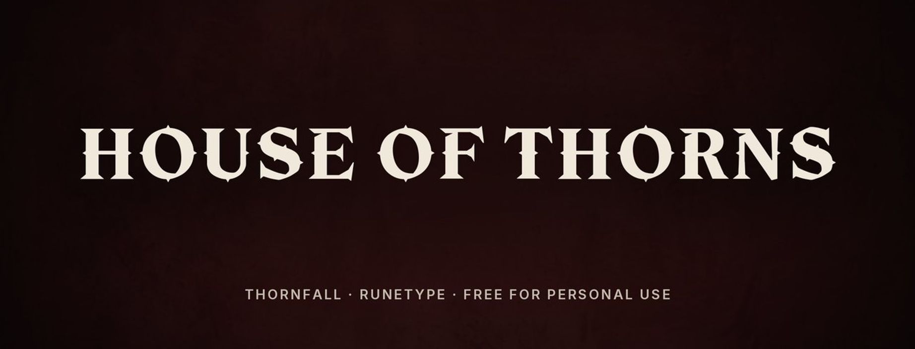 Thornfall medieval fantasy font sample: HOUSE OF THORNS in spiked carved capitals