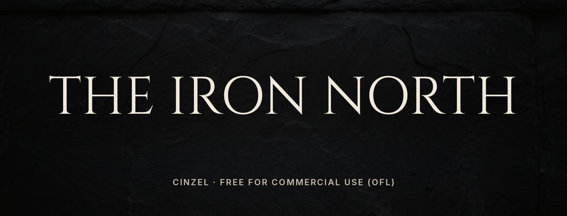 Cinzel font sample: THE IRON NORTH in Roman inscription capitals similar to Trajan