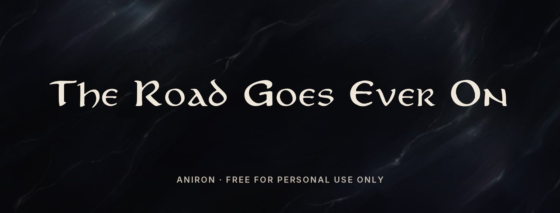 Aniron font sample: The Road Goes Ever On in Lord of the Rings credits style letters