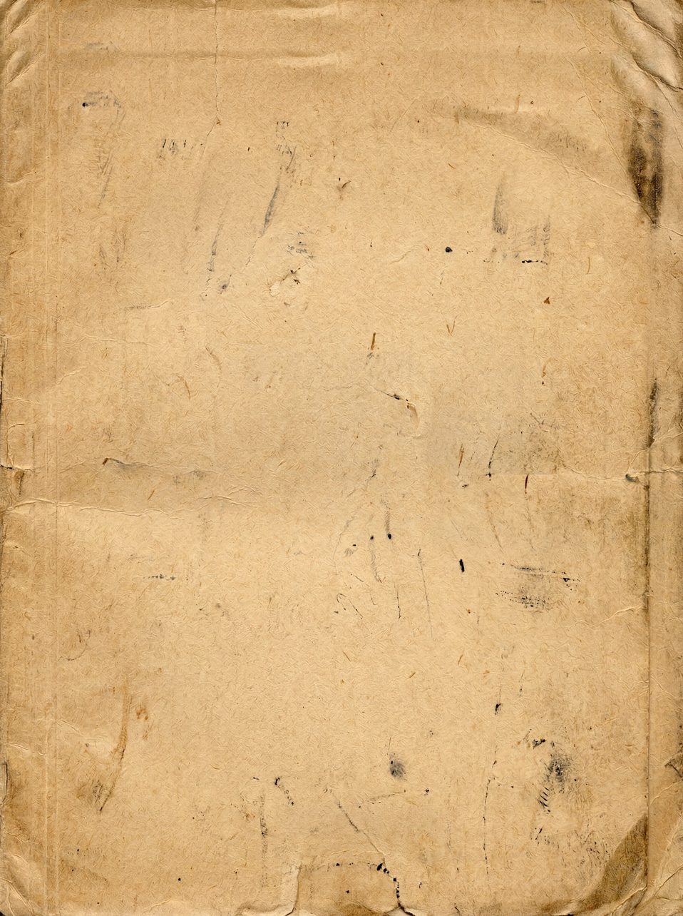 A close-up view of aged, yellowed parchment paper with visible creases, folds, and scattered dark ink splatters.